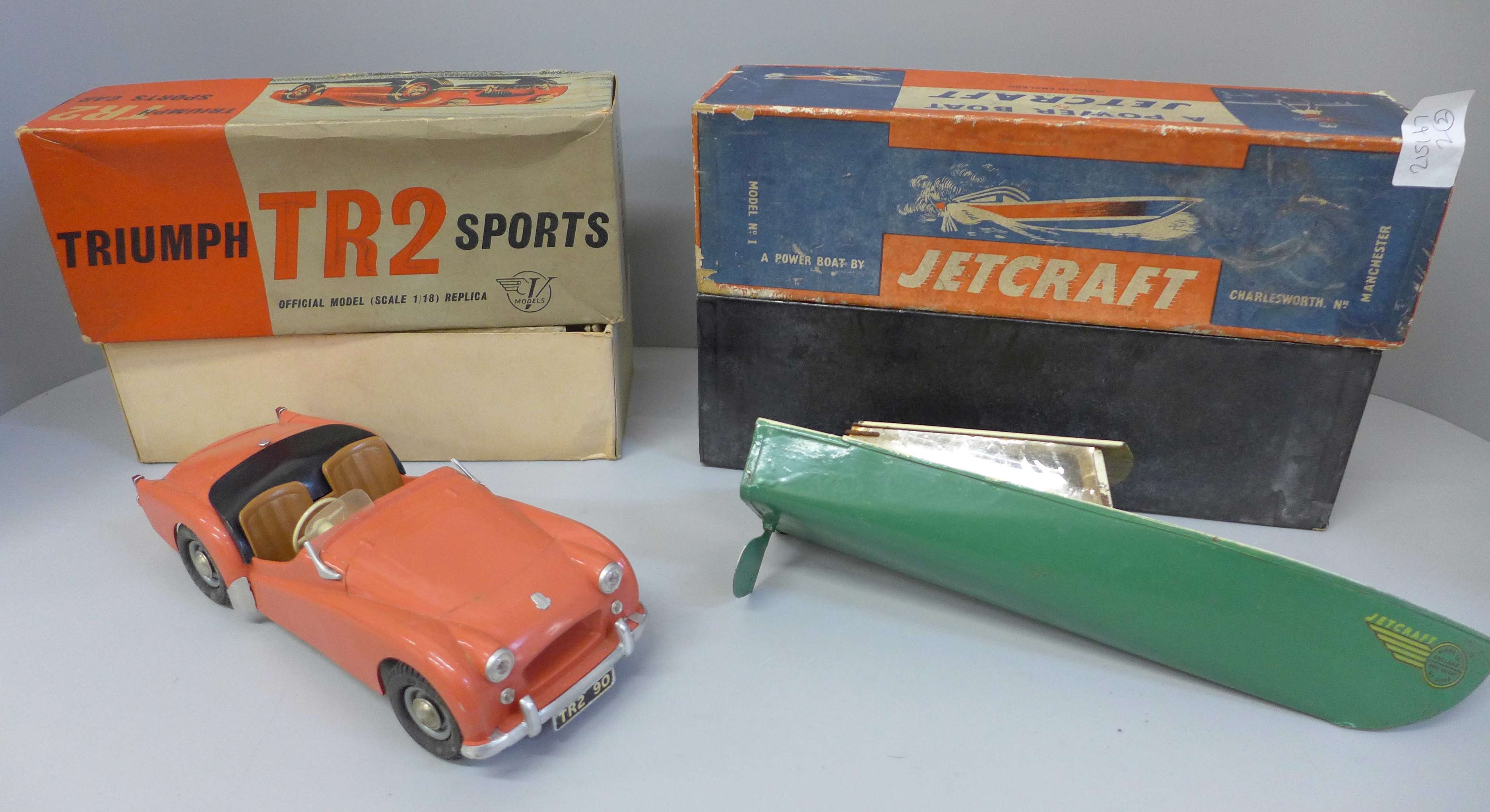 A boxed plastic Victory Models Triumph TR2 Sports Car and a Jetcraft 'pop pop' powered model boat,