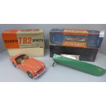 A boxed plastic Victory Models Triumph TR2 Sports Car and a Jetcraft 'pop pop' powered model boat,