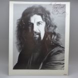 Billy Connolly: a black and white publicity photo, signed in black ink