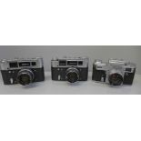 Three Russian 35mm cameras and a collection of lenses