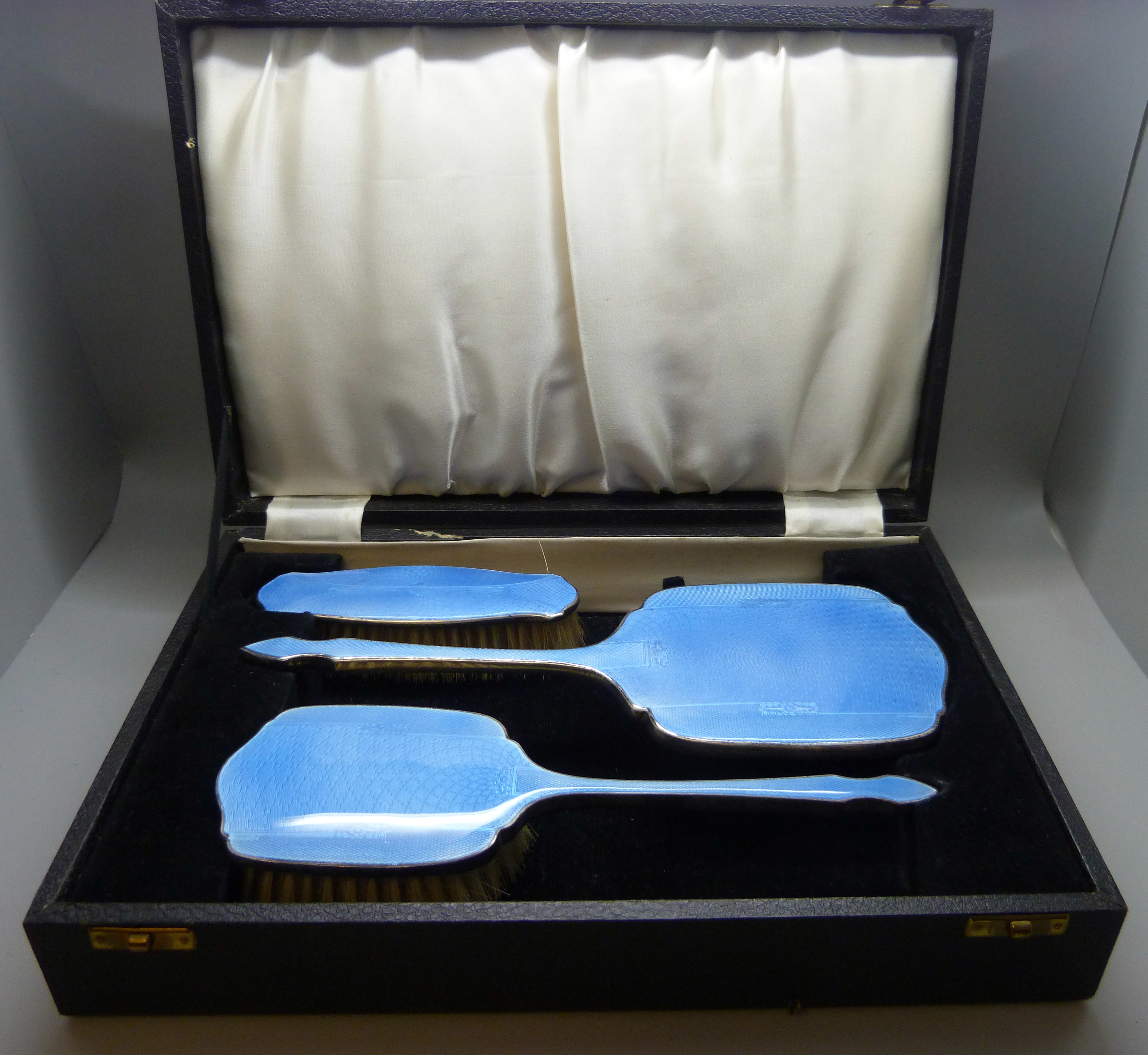 A silver and enamel Art Deco vanity set, Birmingham 1946, boxed