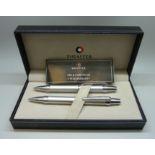 A cased Sheaffer ballpoint pen and pencil set