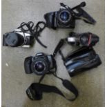 A collection of 35mm cameras, Minolta 500Si, 300Si, Canon EOS 500Z a Fuji FZ-3000 Zoom Date and a