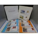 Four albums of WWII commemorative stamp covers, many of which are silks