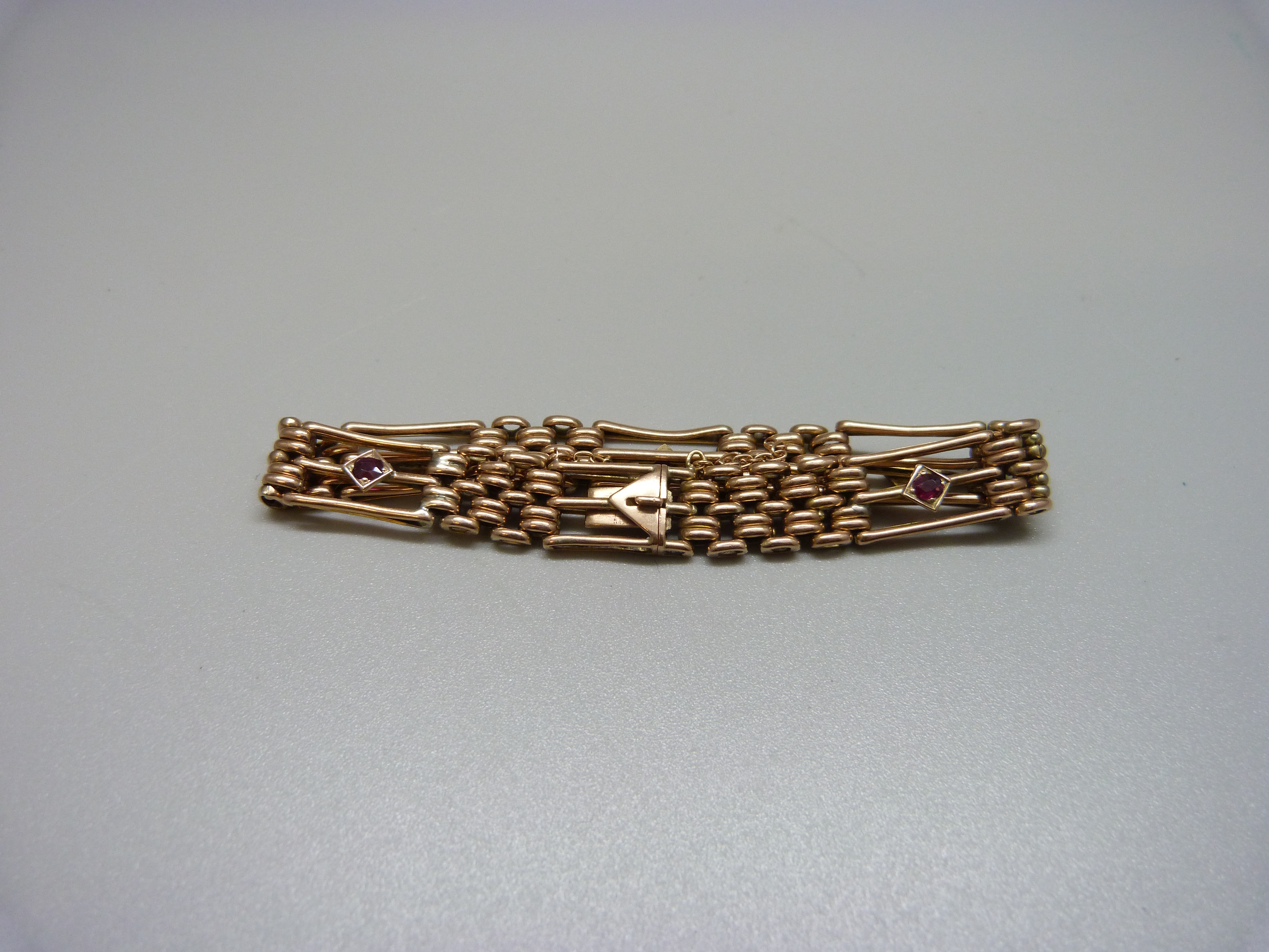 A 9ct gold and garnet bracelet, 14.2g, one seed pearl missing - Image 3 of 3