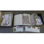 A collection of loose stamps, first day covers and a stamp album