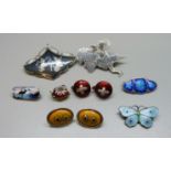 A collection of enamel jewellery; Norway silver brooch, butterfly brooch, a pair of ruby red