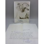 Ginger Rogers: a black and white publicity photo, signed in black pen with covering letter, dated
