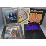 A signed Ozzy Osbourne picture and four Black Sabbath records