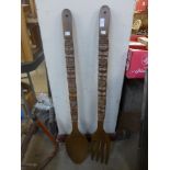 A large wooden spoon and fork