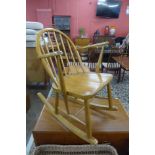 An Ercol Blonde beech rocking chair