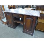 An Edward VII walnut and marble topped washstand