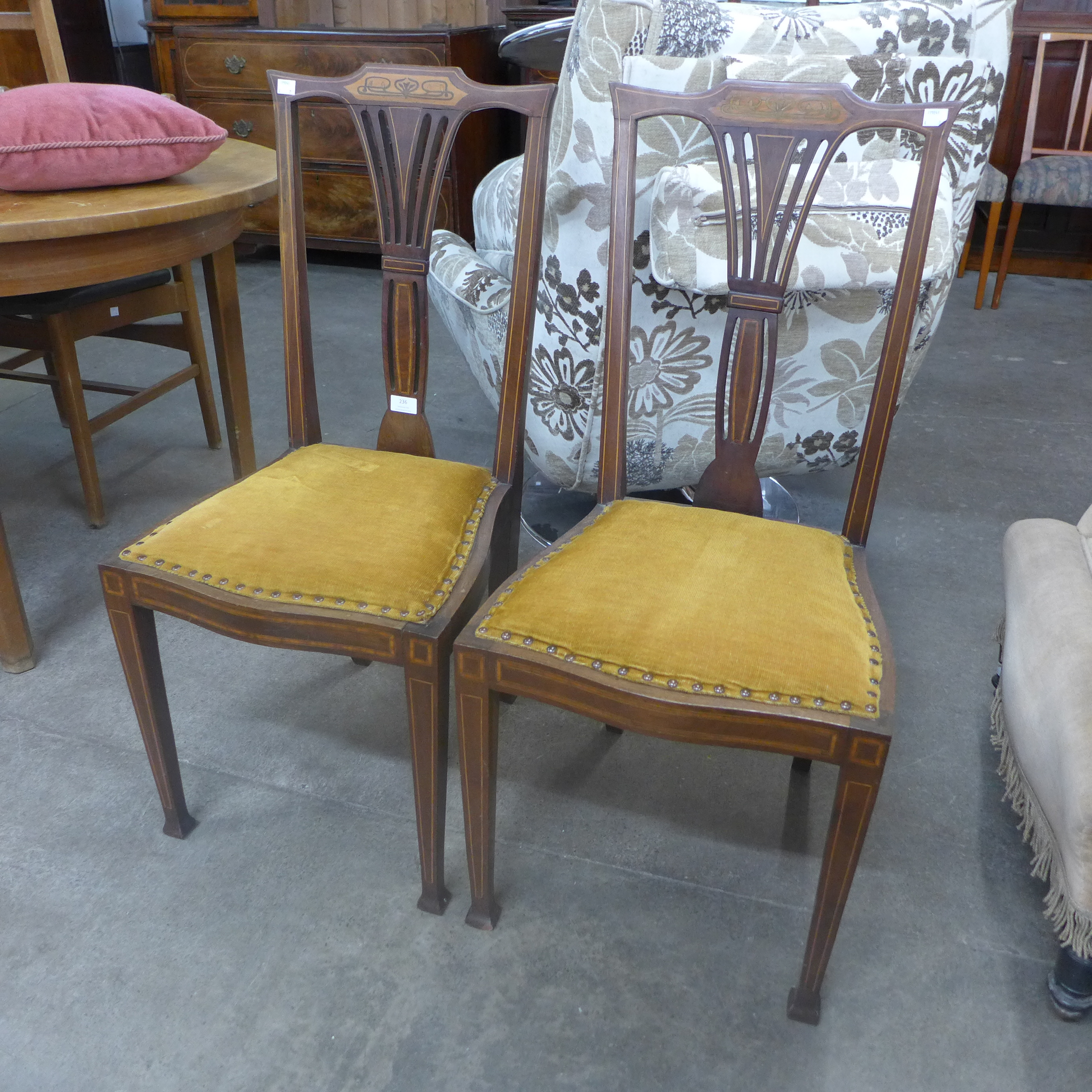 A pair of Edward VII inlaid mahogany side chairs