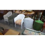 Three painted wicker armchairs and two linen boxes