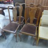 A set of four oak Queen Anne style oak dining chairs