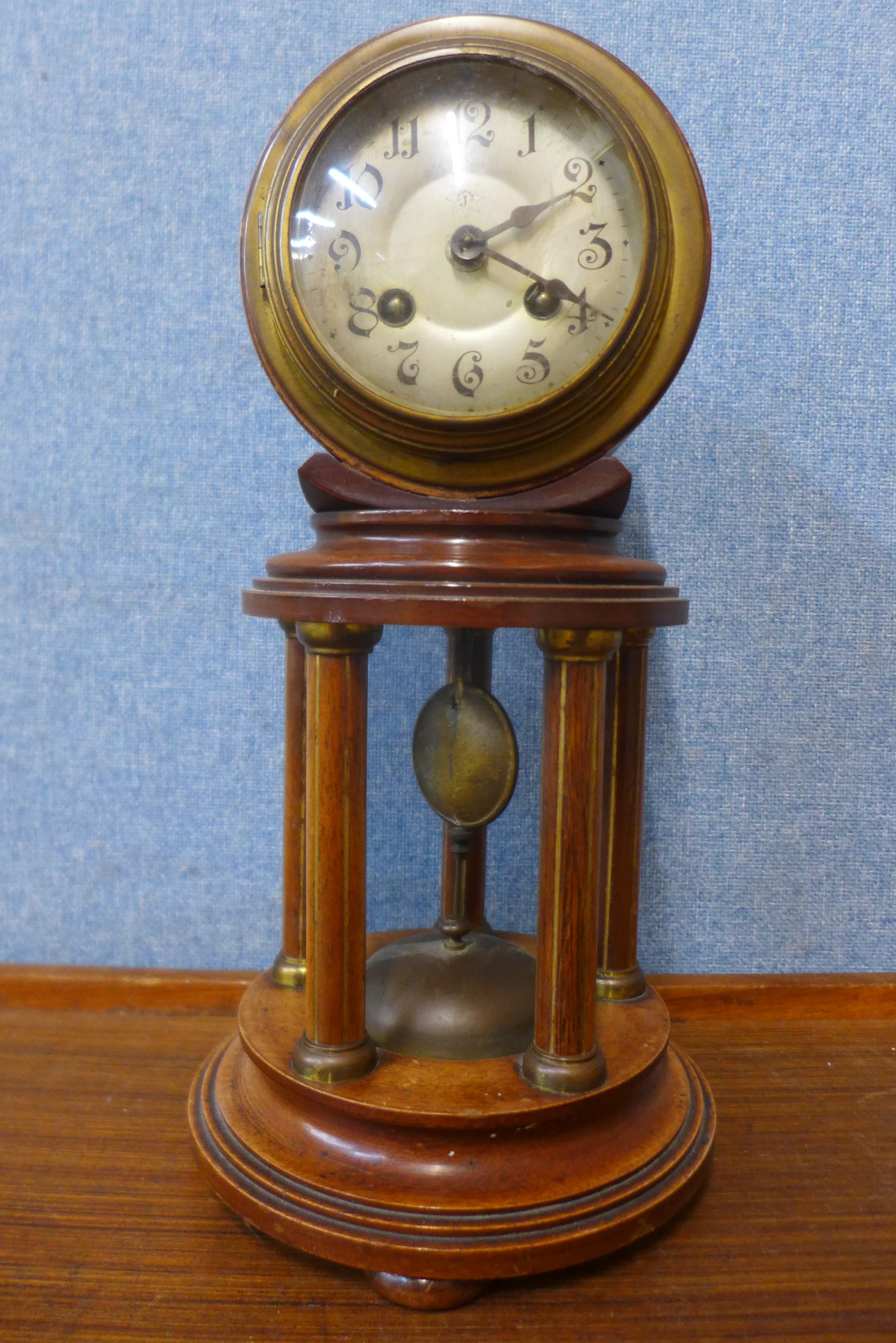 A late 19th Century German Junghans mahogany and parcel gilt temple clock