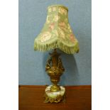 A French style brass and onyx table lamp