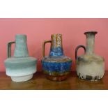 Three assorted West German glazed fat lava pottery jugs