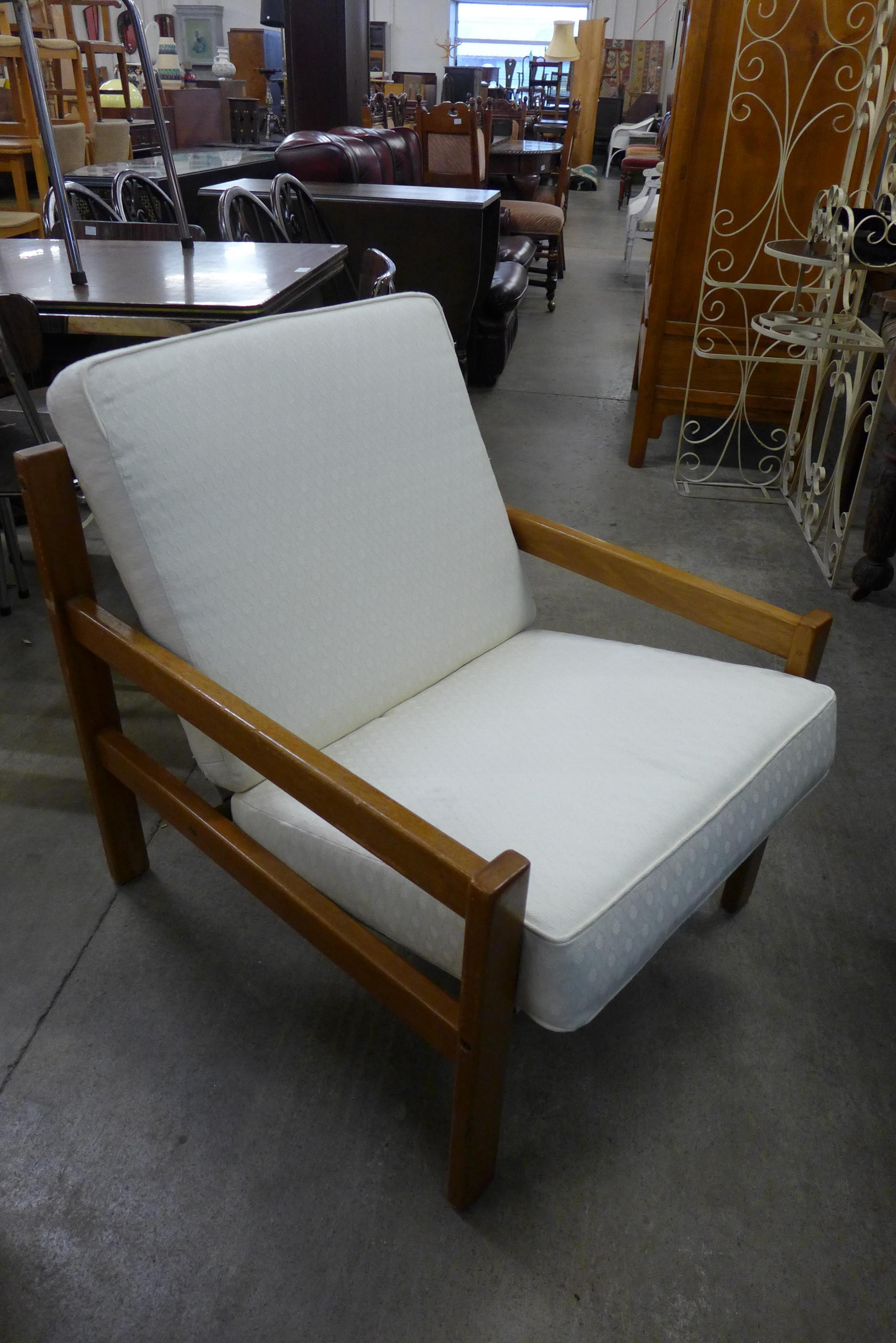 A Scandinavian teak and fabric upholstered upholstered safari lodge chair