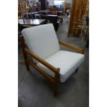 A Scandinavian teak and fabric upholstered upholstered safari lodge chair