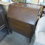 An inlaid mahogany bureau