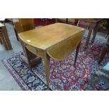 A George IV inlaid mahogany Pembroke table