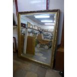 A gilt framed mirror