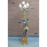 A Venetian style figural floor stranding blackamoor lamp