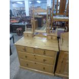 A Victorian waxed pine dressing chest