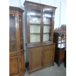 An Edward VII inlaid mahogany bookcase