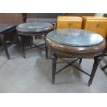 A pair of French style circular beech and marble topped lamp tables