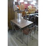 A Belgian Tavo chrome and simulated rosewood extending kitchen table and four chairs