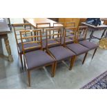 A set of eight McIntosh teak dining chairs