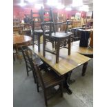 An oak refectory table and six chairs