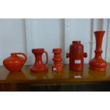 A West German 553-20 Steuler glazed vase, a 340-15 glazed candle stand and three other glazed vases,