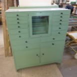 An early/mid 20th Century painted dentist's cabinet