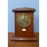 An oak bracket clock, dial signed C.W. Hammonds, Derby