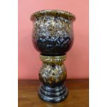 A West German fat lava glazed jardiniere on stand