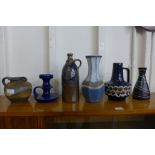 A West German 82-25 fat lava Dümler and Breiden glazed vase and five other glazed jugs, candle