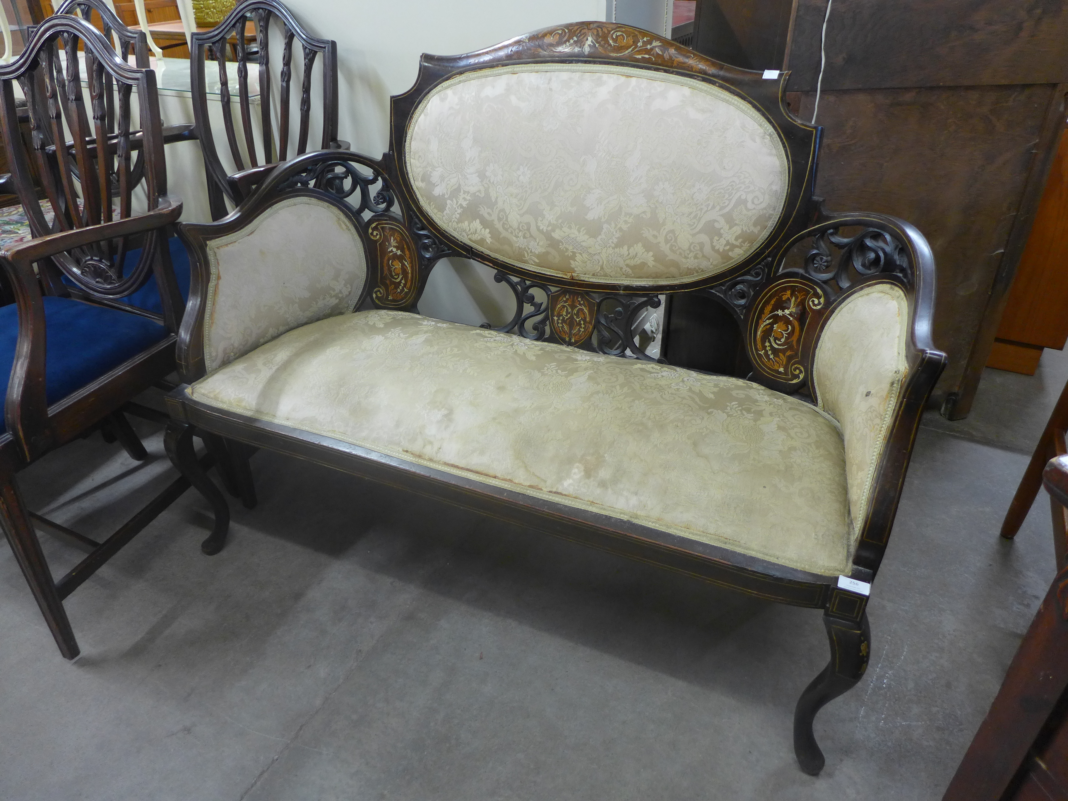 An Edward VII inlaid mahogany and fabric upholstered settee. This lot for sale with non-transferable