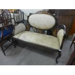 An Edward VII inlaid mahogany and fabric upholstered settee. This lot for sale with non-transferable