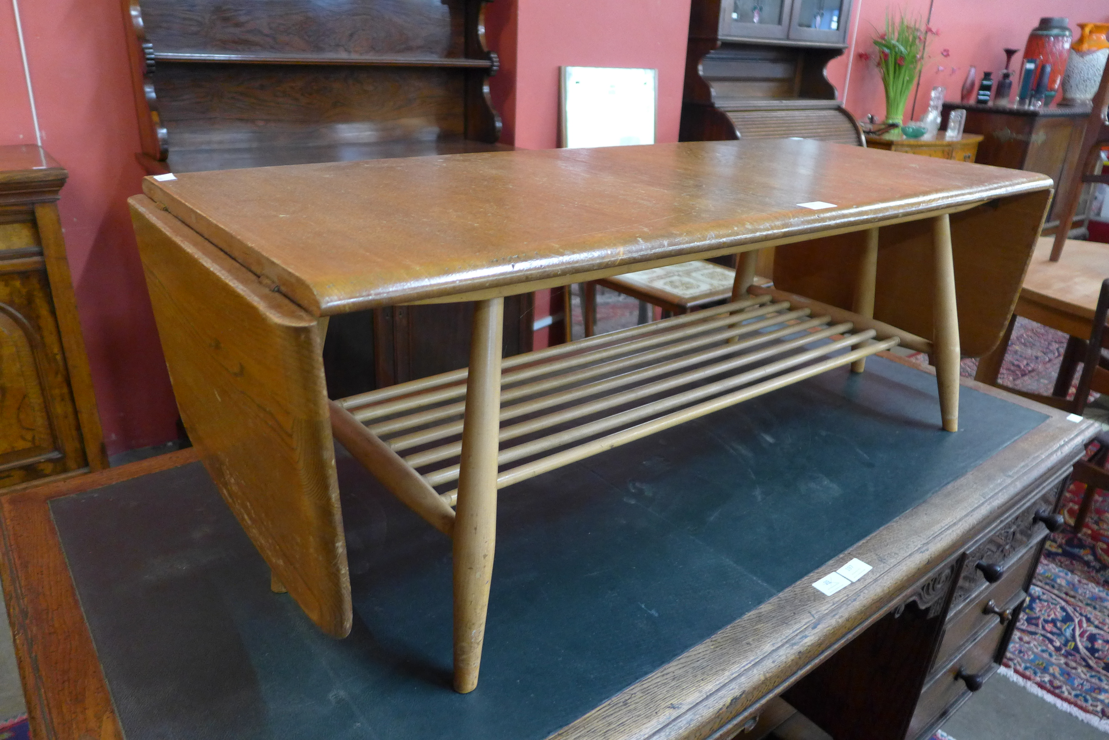 An Ercol Blonde elm and beech drop-leaf Windsor coffee table - Image 2 of 2