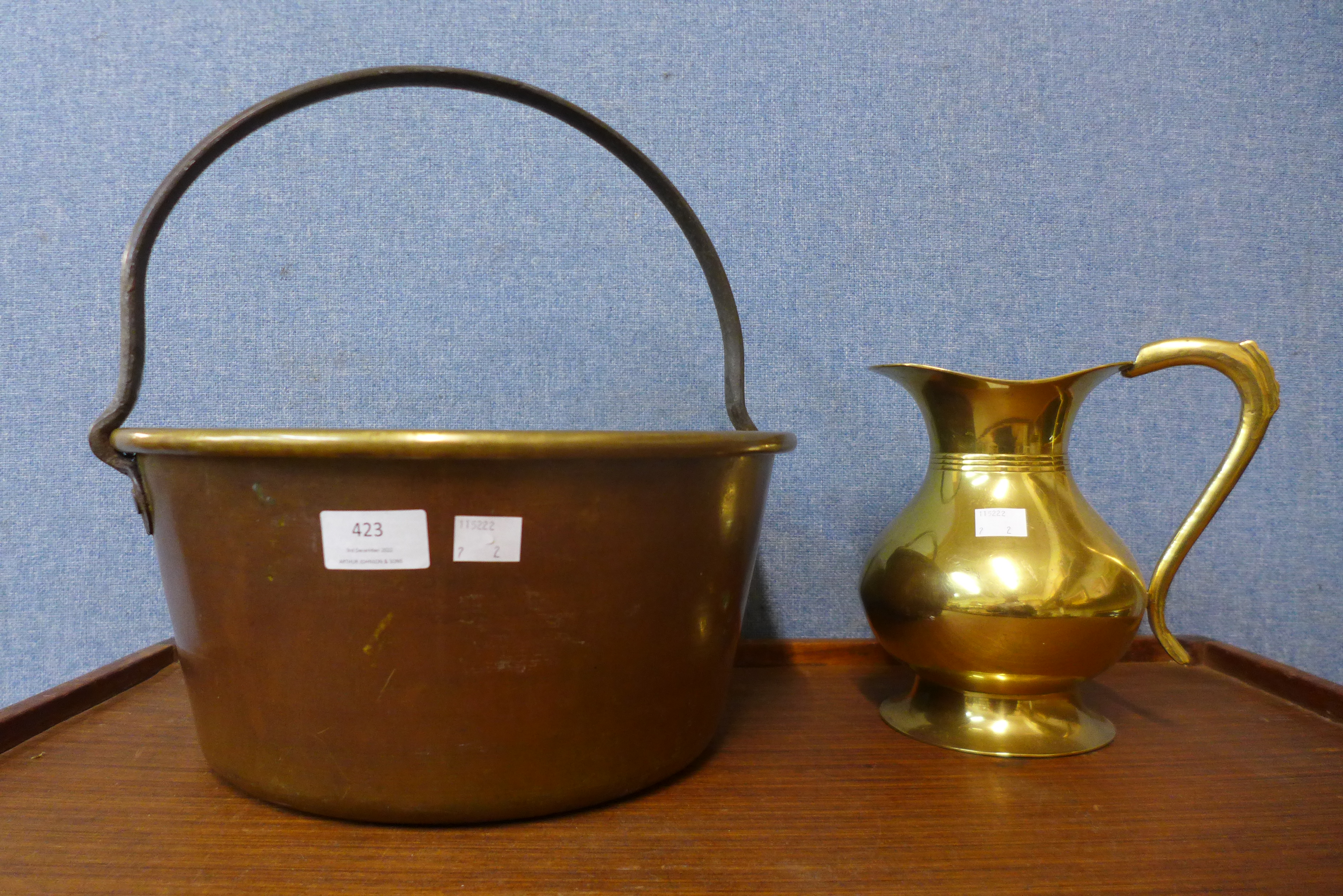 A brass jam pan and a jug