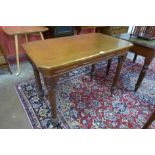 A Victorian Aesthetic Movement oak single drawer writing table