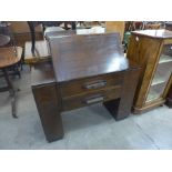 An Art Deco oak bureau bookcase