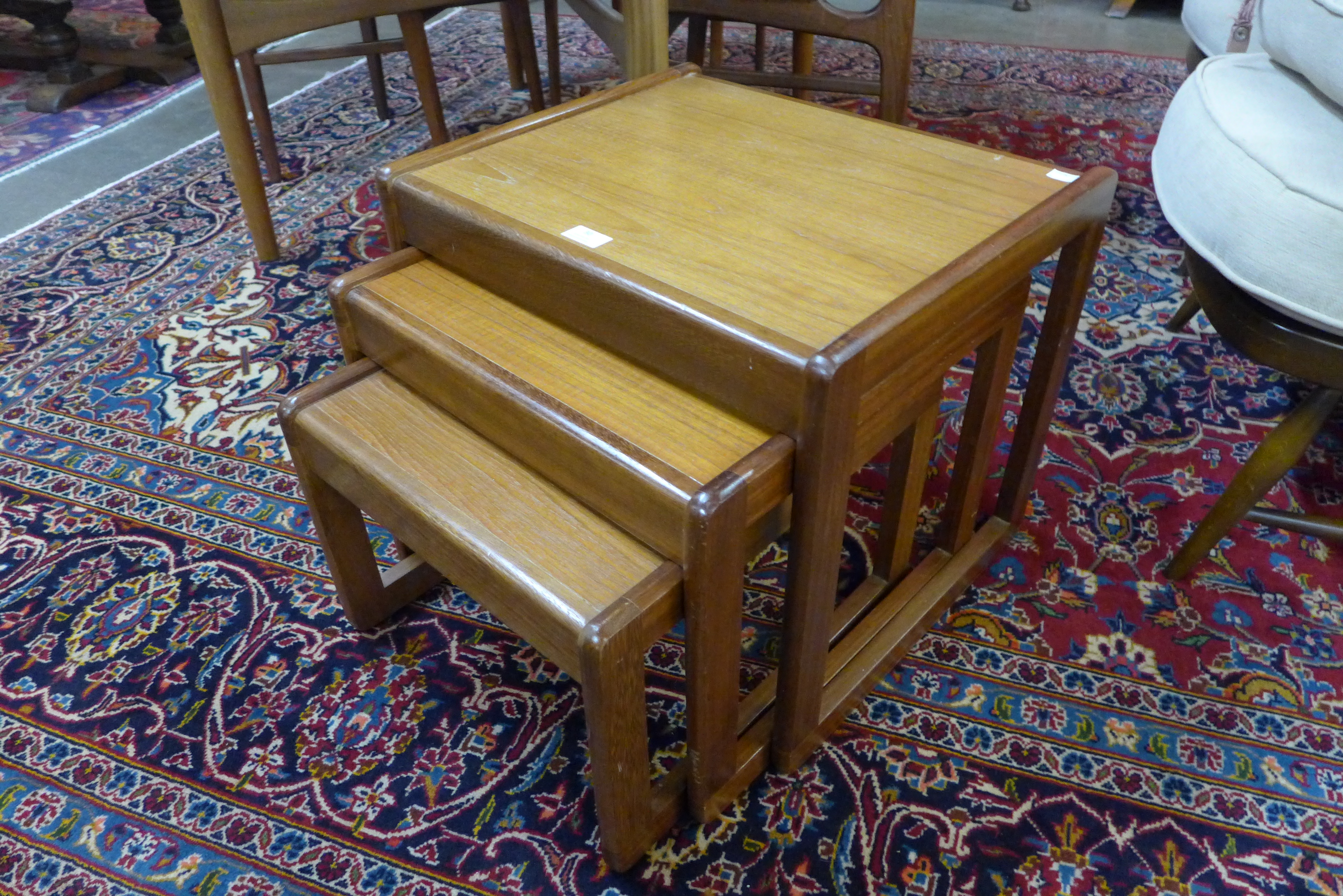 A teak nest of tables