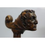 A 19th Century Duke of Wellington 'The Iron Duke' walking stick with carved oak handle and turned