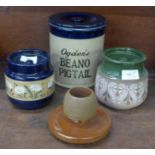 Three Langley pottery jars and a Langley match holder