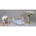 A German porcelain dish with young lady and cherub, a continental figural tazza and a Meissen