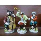 A set of three monkey orchestra figures